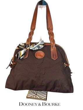 Dooney & Bourke brown nylon domed satchel w/ braided leather handles and trim.